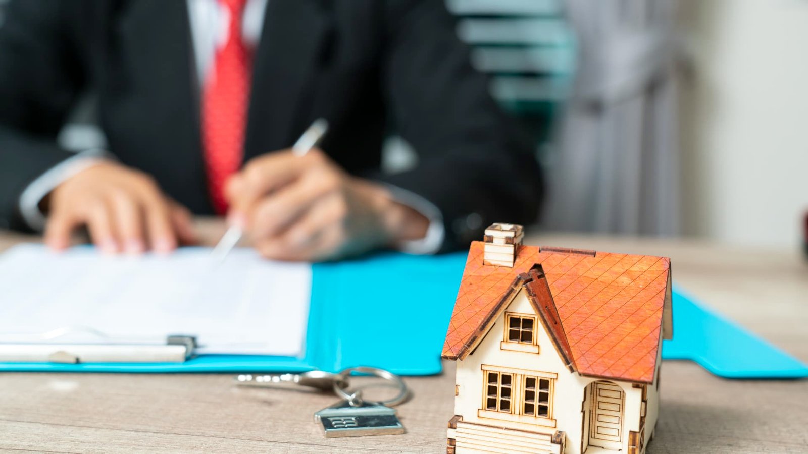 "Homeowners reviewing policy options with an insurance agent for reliable homeowners insurance near me."